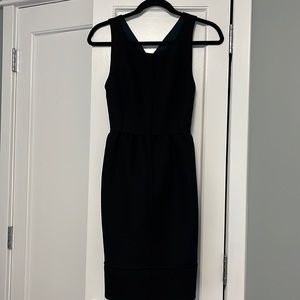 Maeve / Anthropologie black dress, cross back with pockets size 6P us